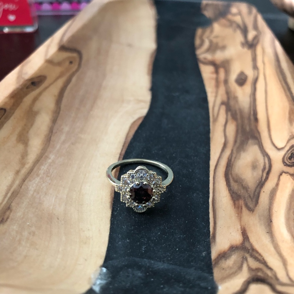 Elegant Gold and Purple Gemstone Ring